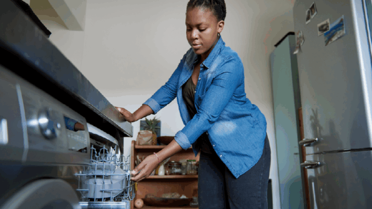 woman loading the dishwasher